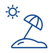 Beach with umbrella and sun